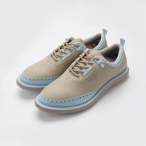 Beige and light blue shoes on a white background sell at Paradise Golf