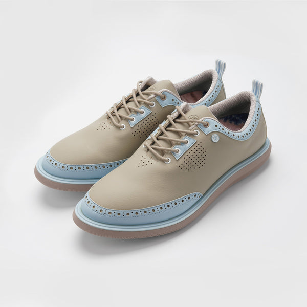 Beige and light blue shoes on a white background sell at Paradise Golf