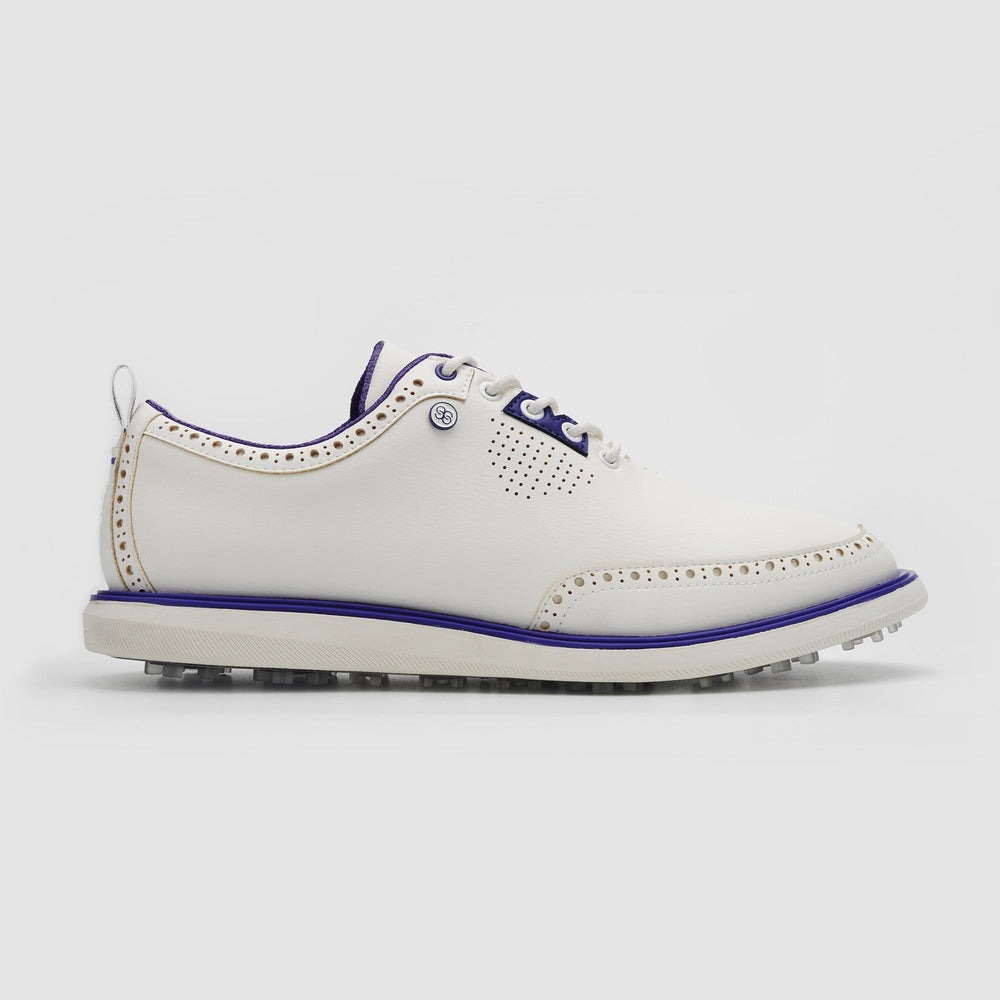 White golf shoe with blue accents on a light gray background sells at Paradise Golf