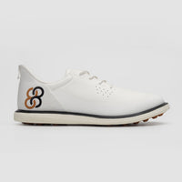 White shoe with a logo on a white background sells at Paradise Golf