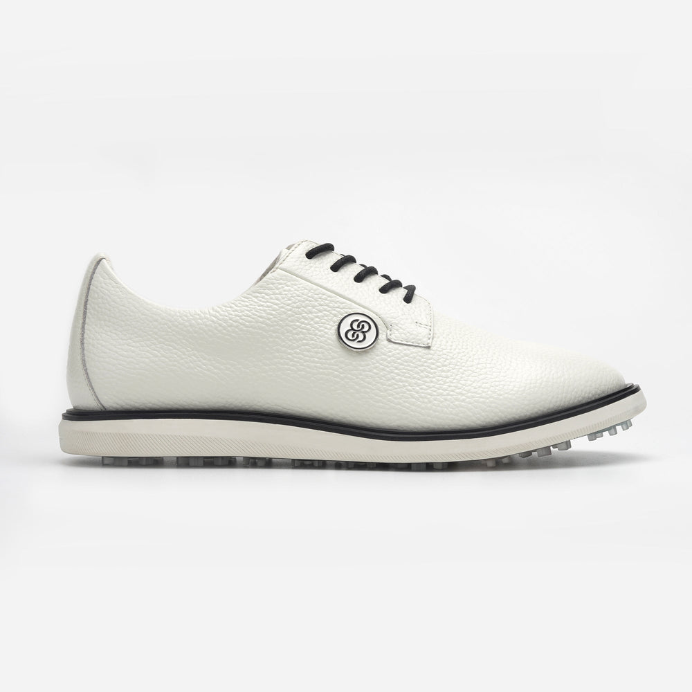 White golf shoe with black sole on a white background sells at Paradise Golf