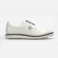 White golf shoe with black sole on a white background sells at Paradise Golf