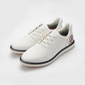 White sneakers with black accents on a light gray background sell at Paradise Golf