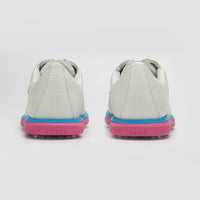 White sneakers with blue and pink soles on a white background sells at Paradise Golf