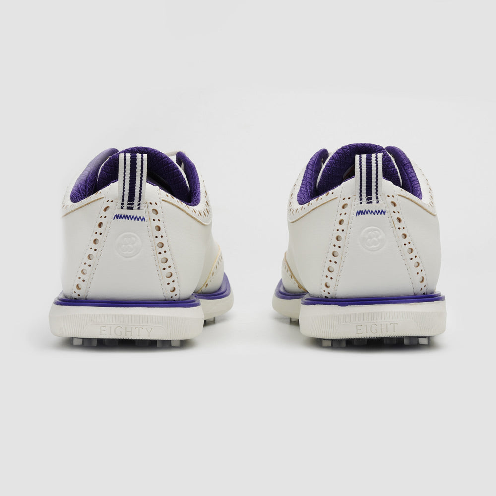 White bowling shoes with purple accents on a light gray background sells at Paradise Golf