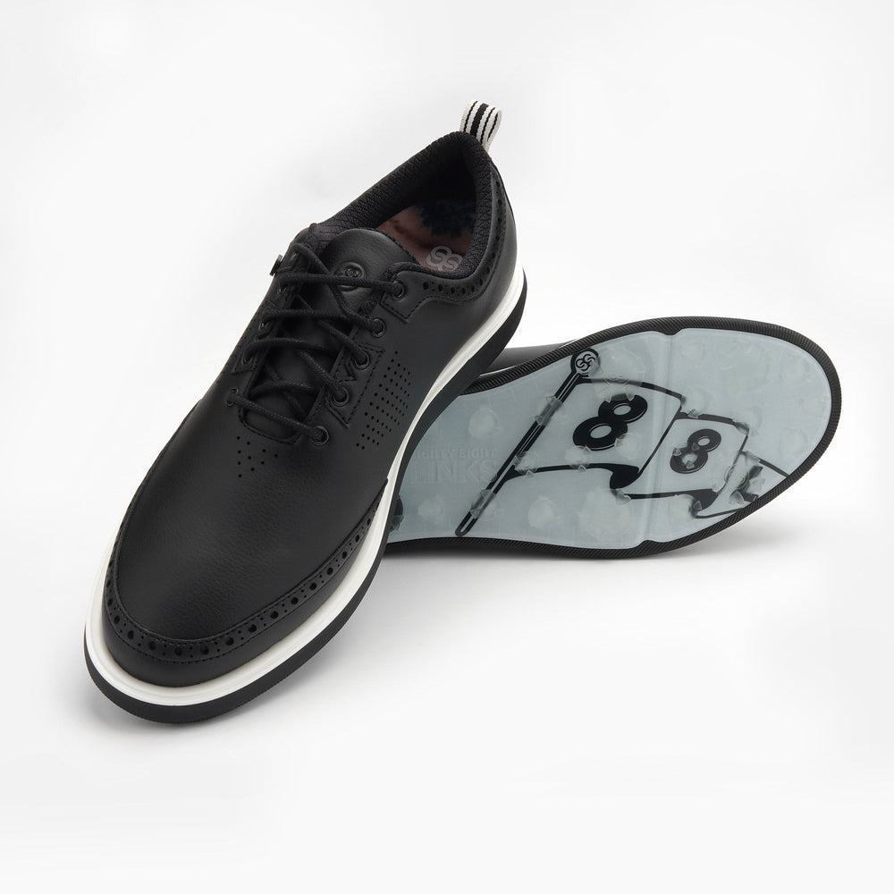 Black leather shoe with a transparent insole displaying numbers on a white background sells at Paradise Golf