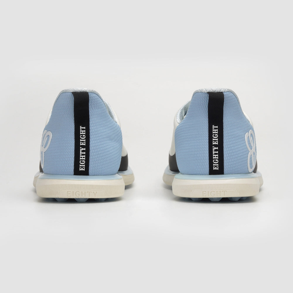 Light blue sneakers with black accents and 'EIGHTY EIGHT' branding on a white background sell at Paradise Golf