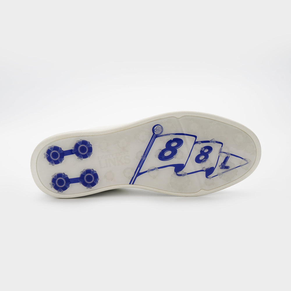 White shoe sole with blue designs on a white background sells at Paradise Golf