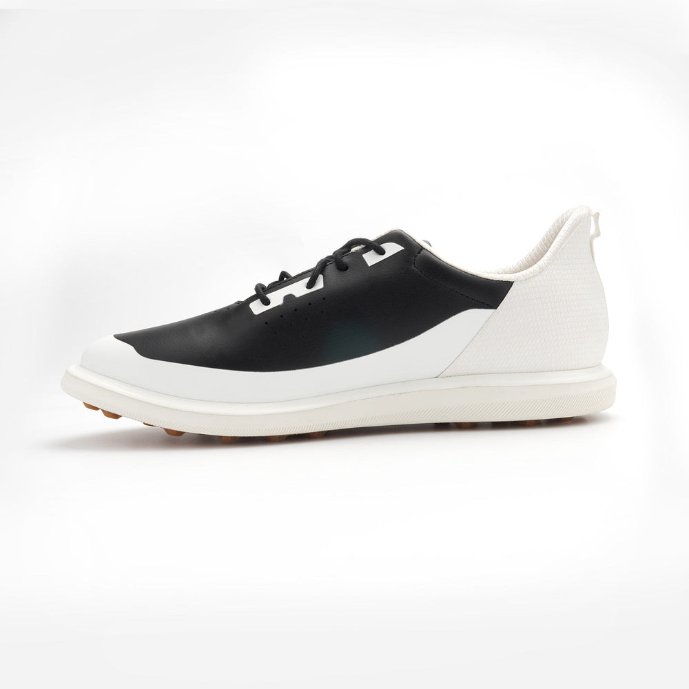 Black and white sneaker on a white background sells at Paradise Golf