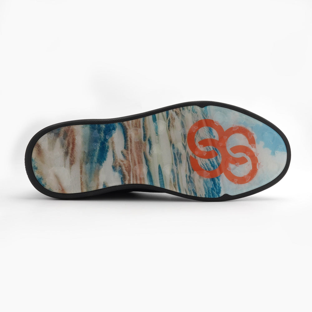 Shoe sole with an abstract pattern and an orange logo on a white background sells at Paradise Golf