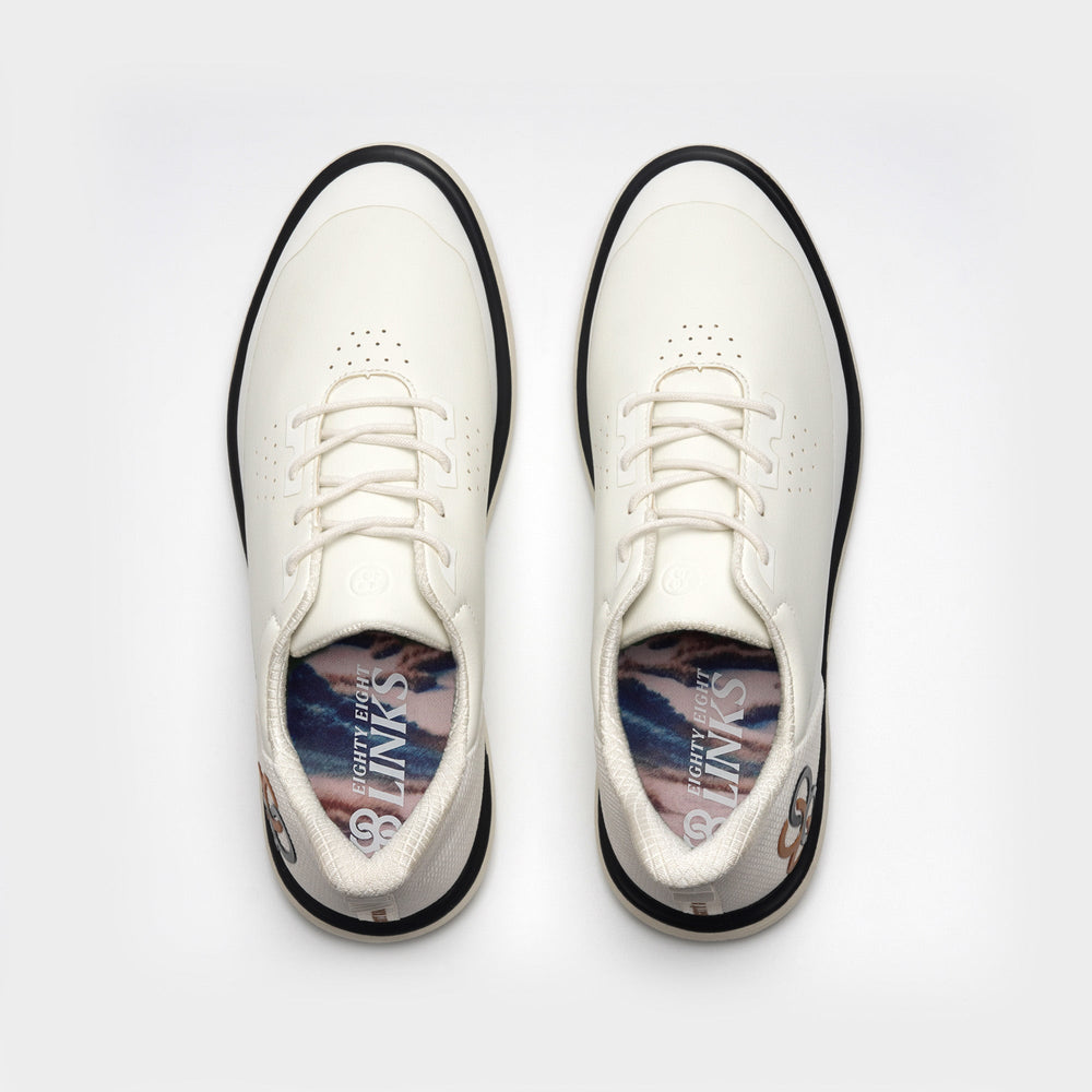 White golf shoes with black soles on a white background sells at Paradise Golf