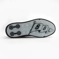 Close-up of a shoe sole with a number '8' design on a white background sells at Paradise Golf