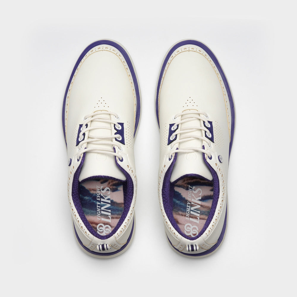 White shoes with purple soles on a white background sells at Paradise Golf